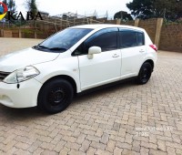 nissan-tiida-hatchback-pearl-white-small-0