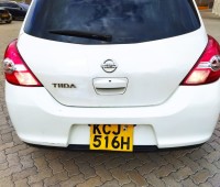 nissan-tiida-hatchback-pearl-white-small-5