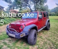 2013-kdt-jeep-wrangler-sahara-small-1