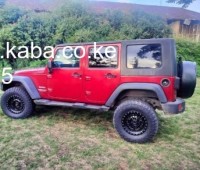 2013-kdt-jeep-wrangler-sahara-small-2